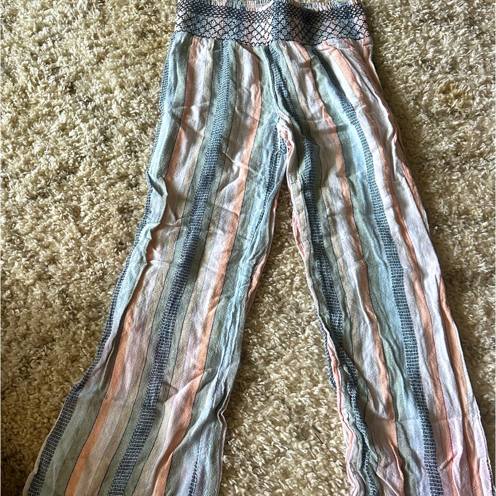 Size small indigo Rex palazzo pants. Slight discoloration on back bottom leg